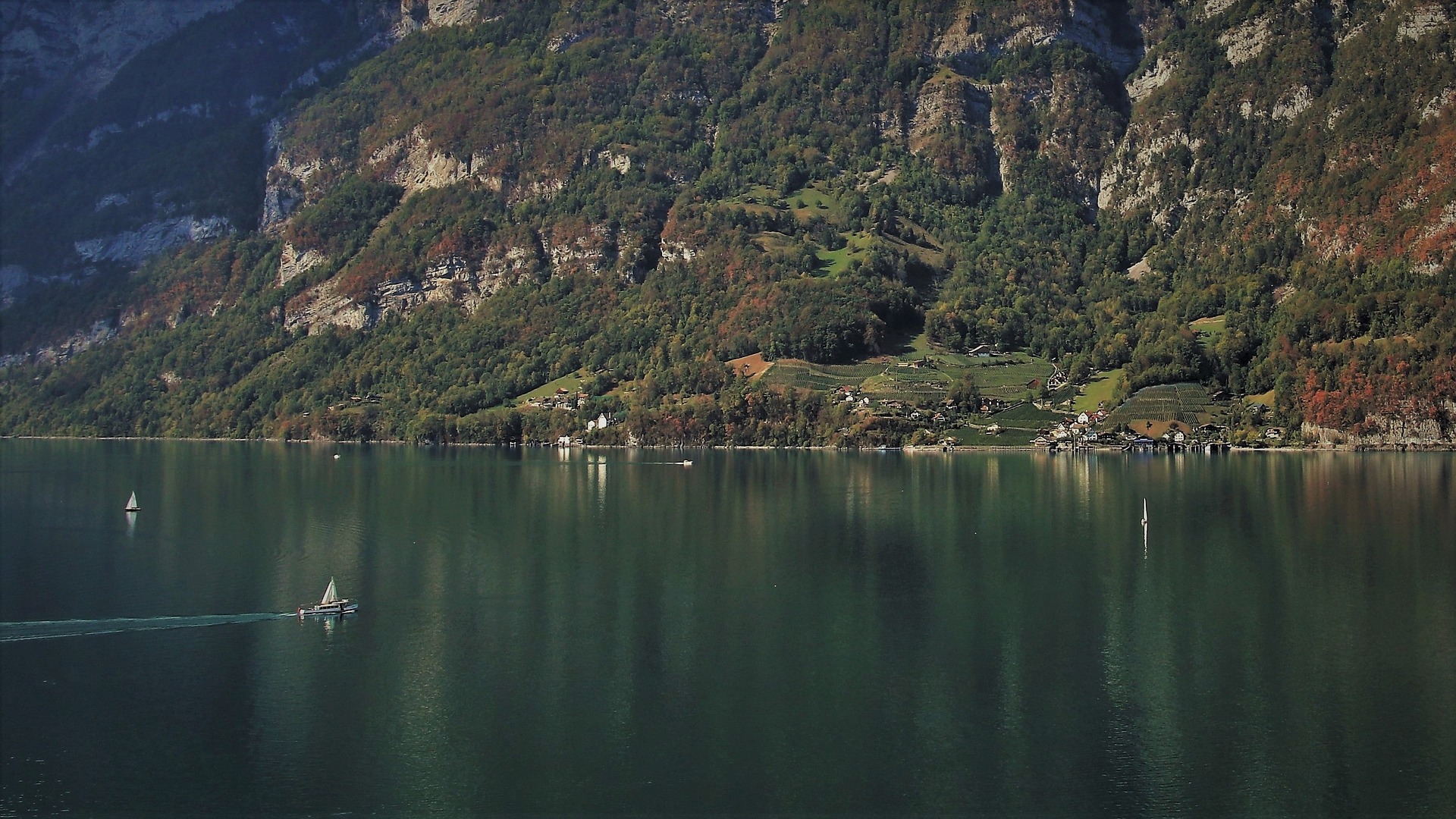 Astronaut standing on gray sand
