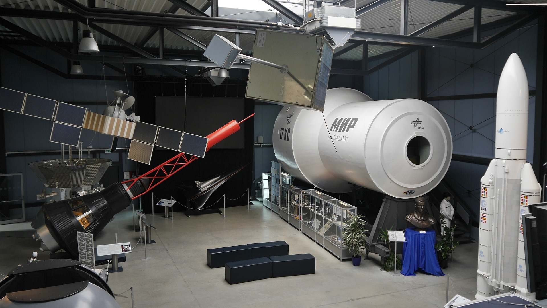 Astronaut standing on gray sand